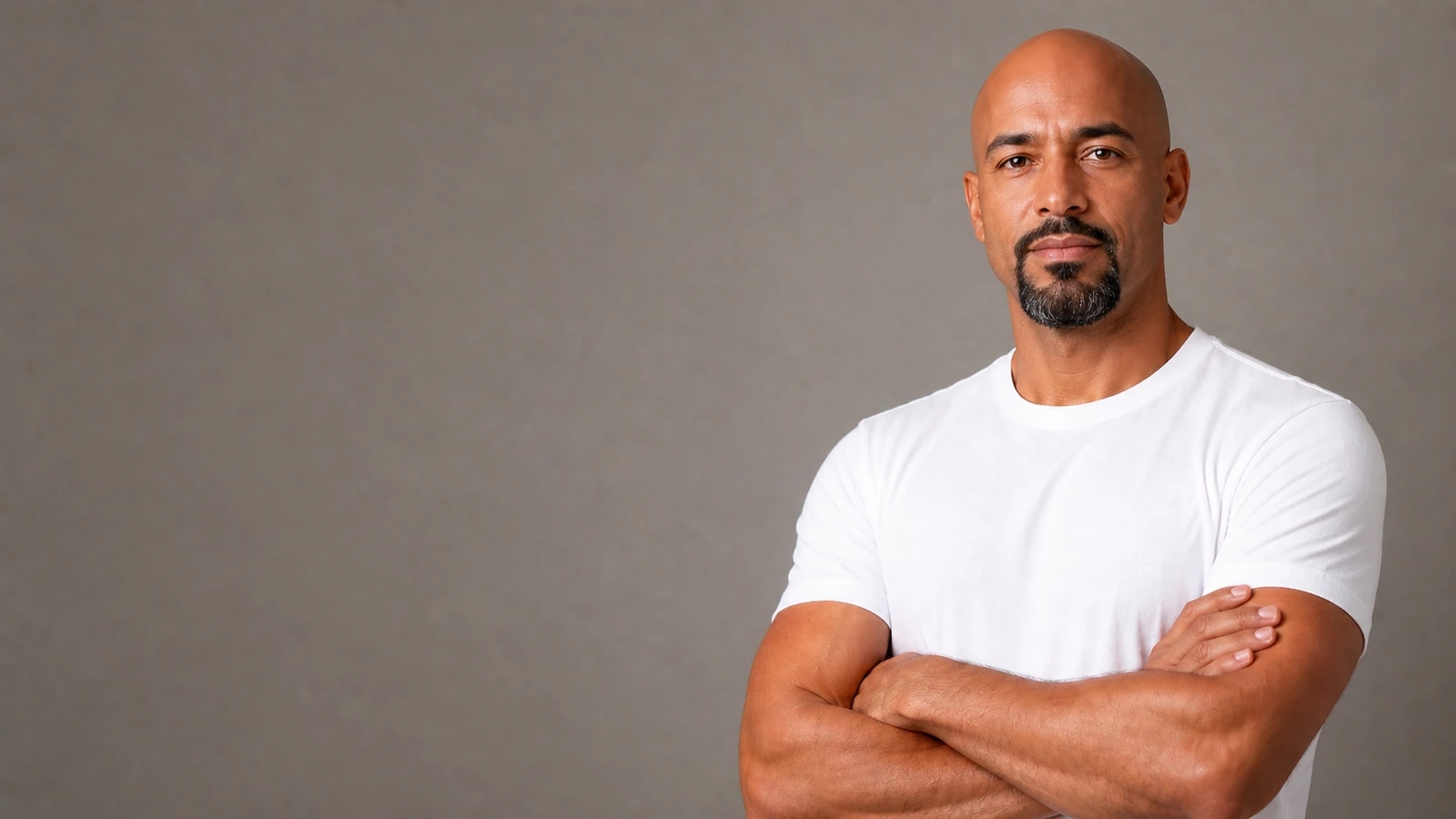 Bald head with goatee-style facial hair balance
